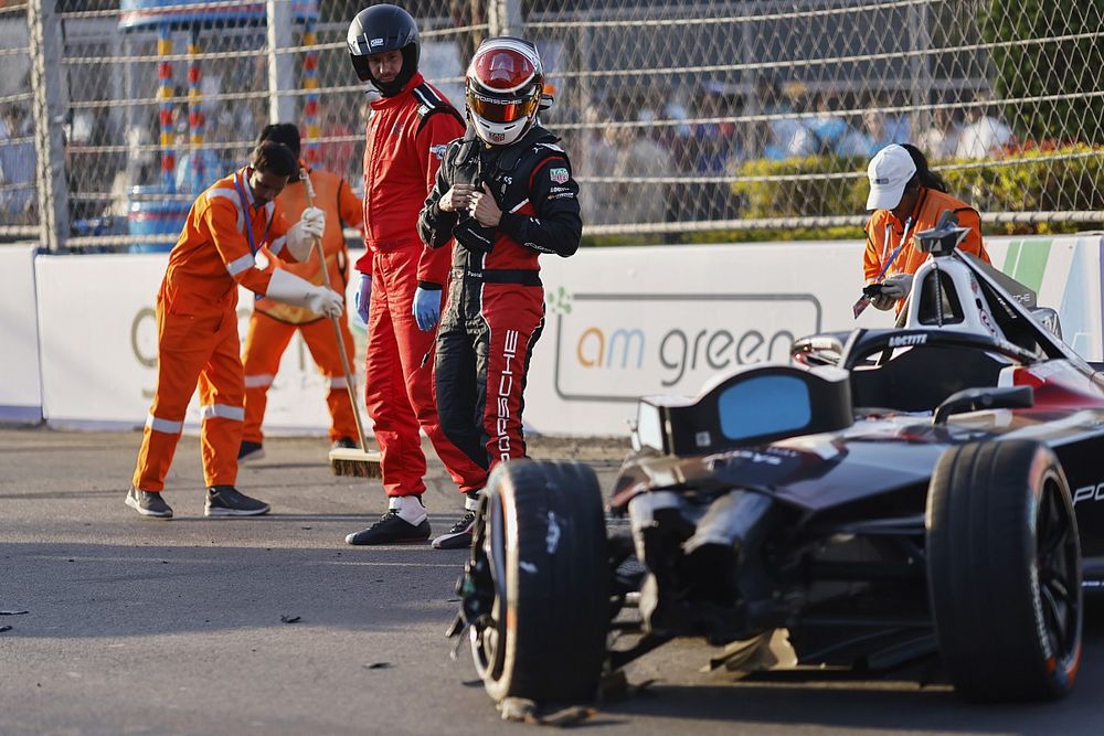 Pascal Wehrlein, Porsche, Porsche 99X Electric Gen3, walks away from his damaged car after a heavy crash