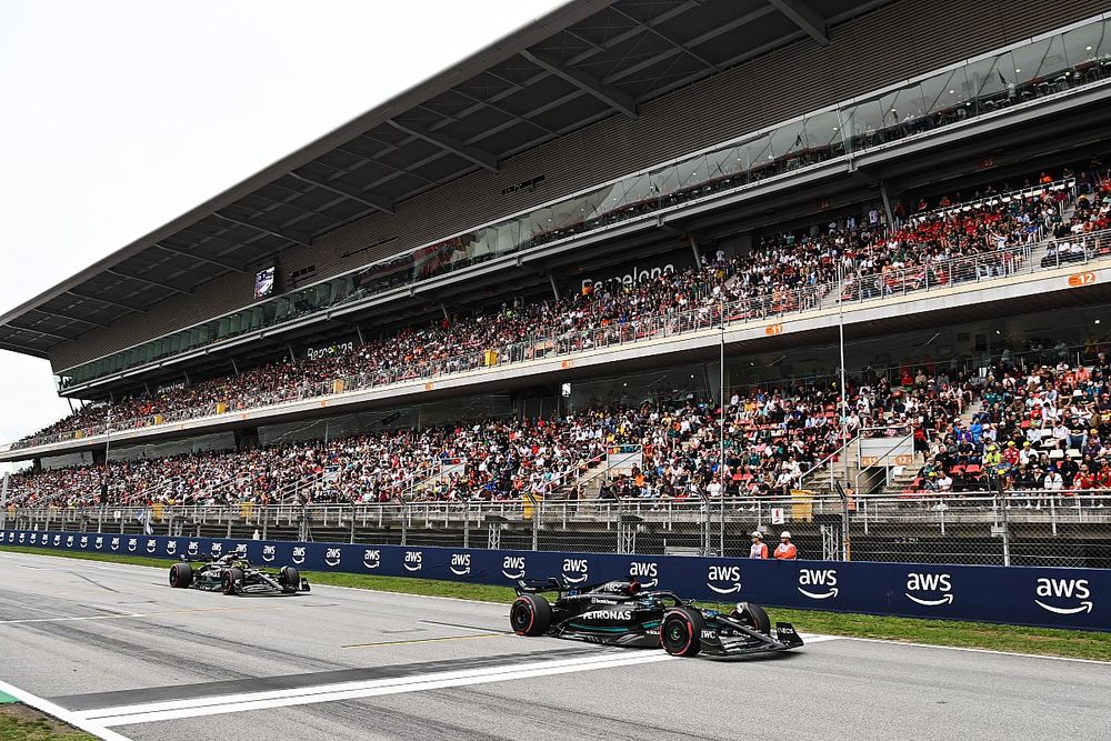 George Russell, Mercedes F1 W14, leads Sir Lewis Hamilton, Mercedes F1 W14