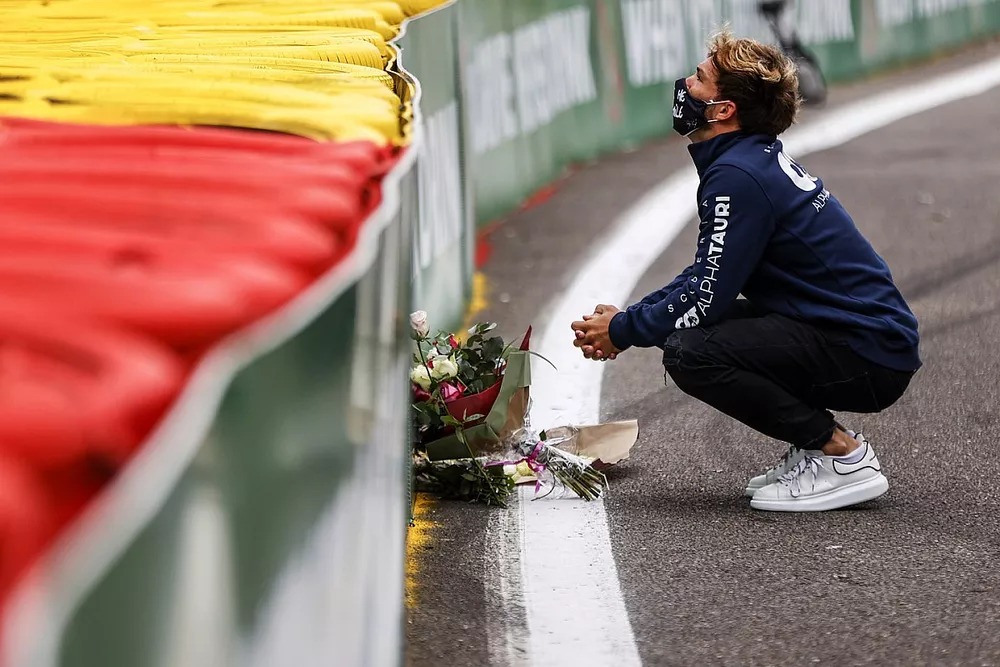 Pierre Gasly, AlphaTauri, lays flowers in memory of Anthoine Hubert, who passed away at this spot in 2019