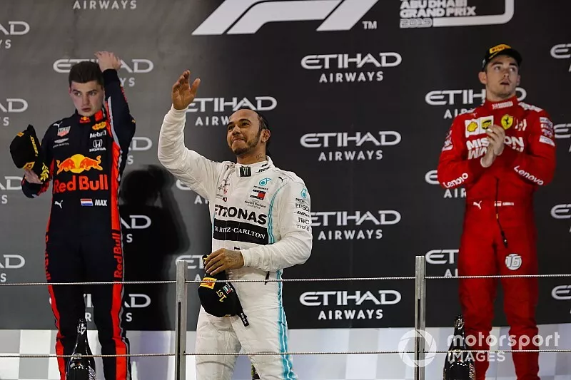 Max Verstappen, Red Bull Racing, 2nd position, Lewis Hamilton, Mercedes AMG F1, 1st position, and Charles Leclerc, Ferrari, 3rd position, on the podium