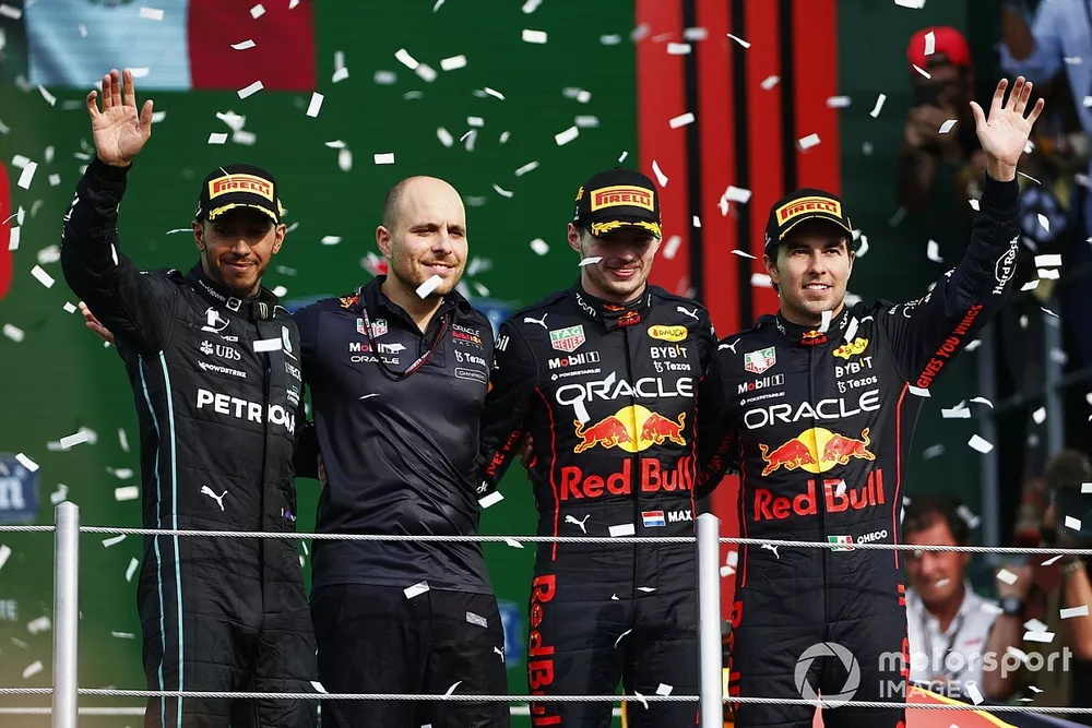 Lewis Hamilton, Mercedes AMG, 2nd position, the Red Bull constructors trophy delegate, Max Verstappen, Red Bull Racing, 1st position, Sergio Perez, Red Bull Racing, 3rd position, on the podium