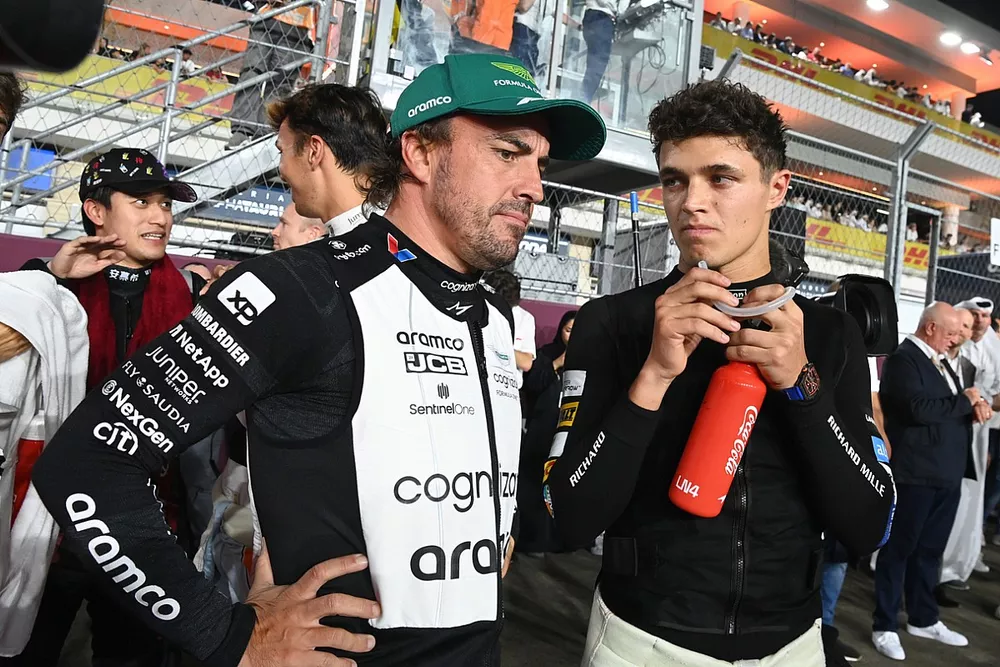 Fernando Alonso, Aston Martin F1 Team, Lando Norris, McLaren, on the grid