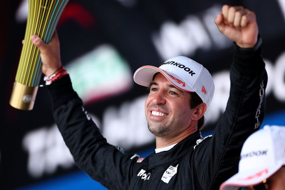 Antonio Felix da Costa, Porsche, 1st position, lifts the trophy in celebration 