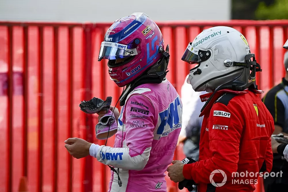 Lance Stroll, Racing Point, et Sebastian Vettel, Ferrari, dans le parc ferm&eacute; apr&egrave;s la course