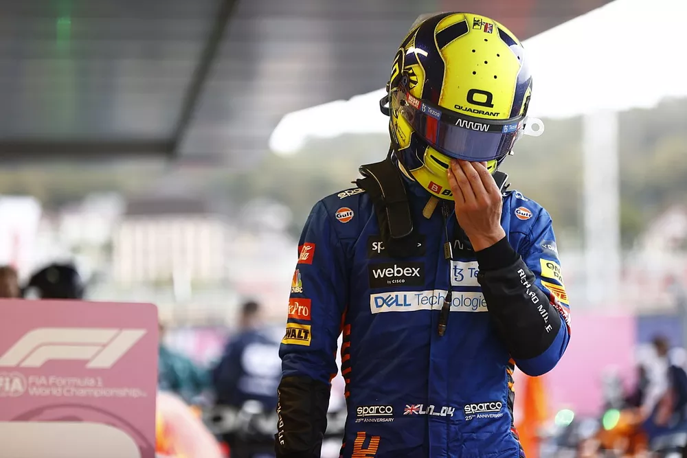 Lando Norris, McLaren, comiserates with himself after the race
