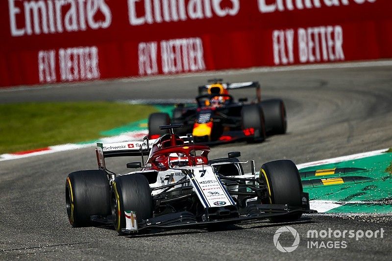 Kimi Raikkonen, Alfa Romeo Racing C38, leads Max Verstappen, Red Bull Racing RB15