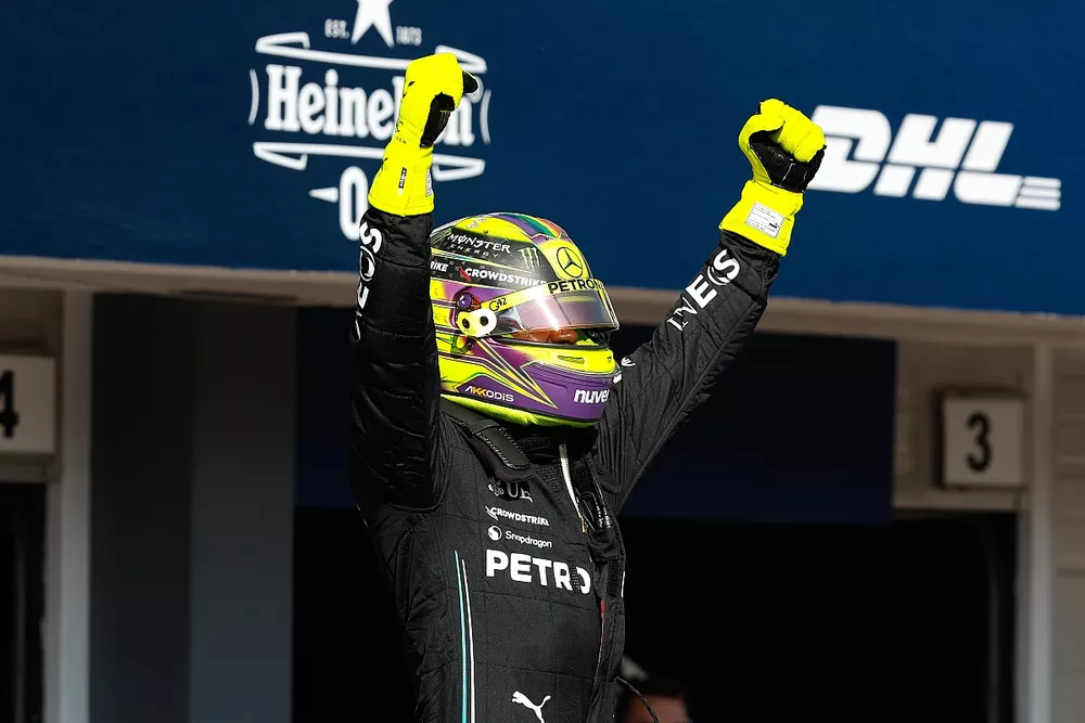 Pole man Lewis Hamilton, Mercedes-AMG, celebrates on arrival in Parc Ferme