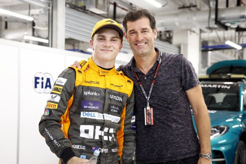 Oscar Piastri y Mark Webber