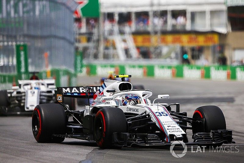 Sergey Sirotkin, Williams FW41, leads Marcus Ericsson, Sauber C37