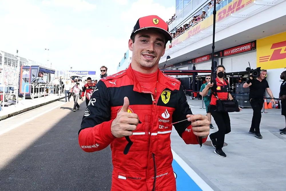 Pole man Charles Leclerc, Ferrari, celebrates after Qualifying