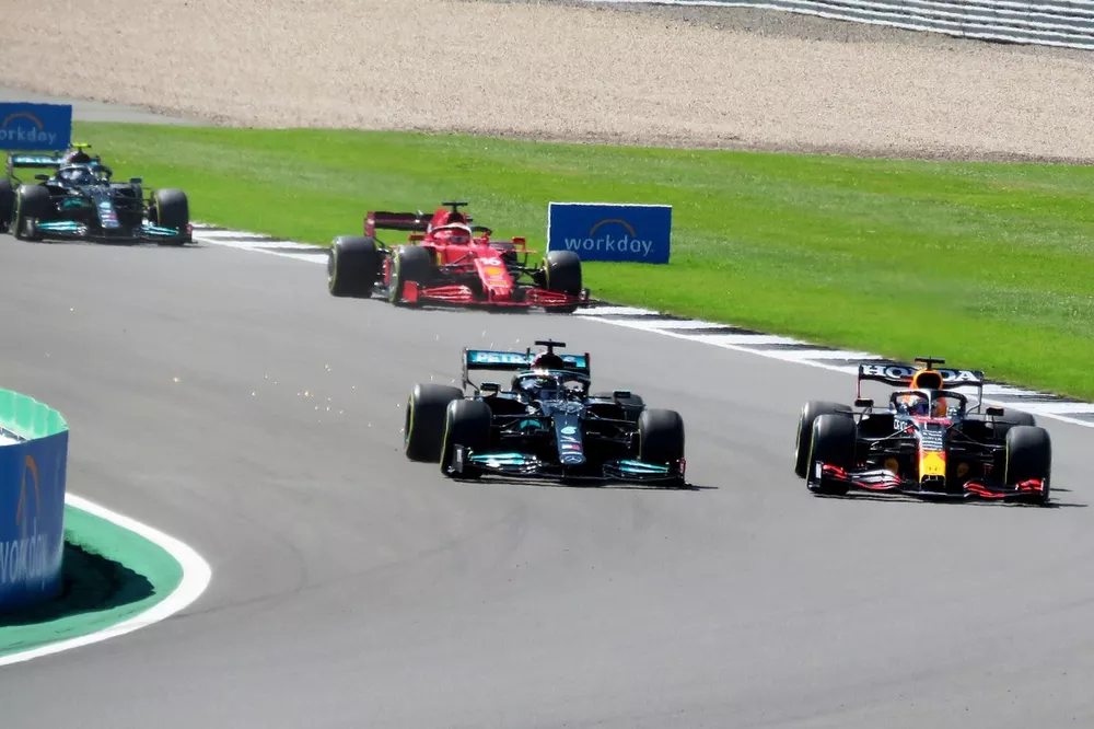 Sir Lewis Hamilton, Mercedes W12 and Max Verstappen, Red Bull Racing RB16B just before they come together.