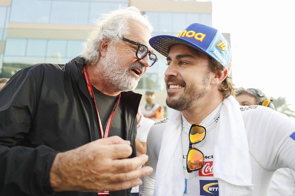 Fernando Alonso, McLaren, with Flavio Briatore on the grid