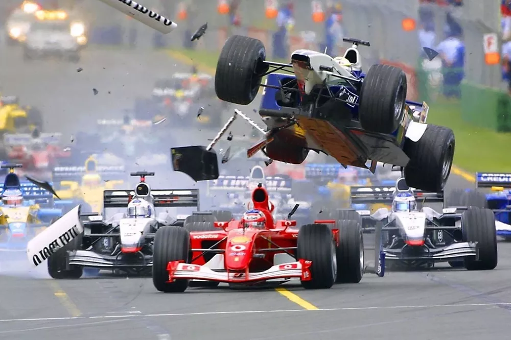 Ralf Schumacher flies over Rubens Barrichello