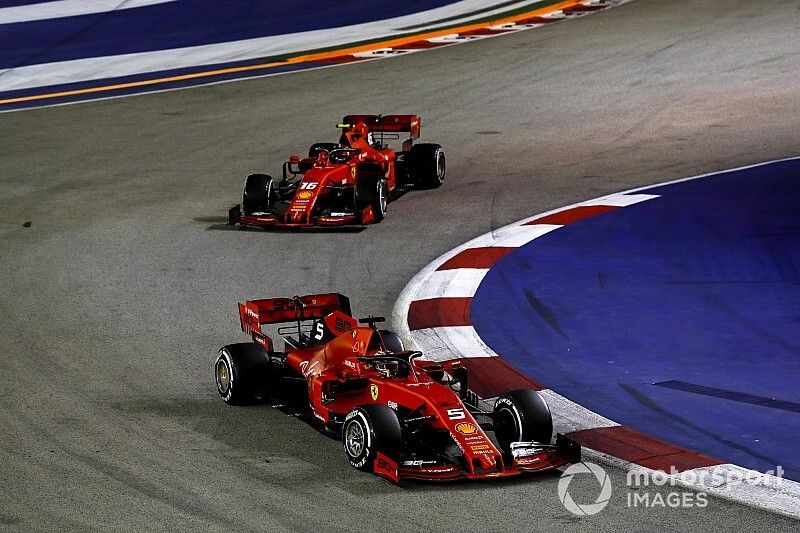Sebastian Vettel, Ferrari SF90 leads Charles Leclerc, Ferrari SF90