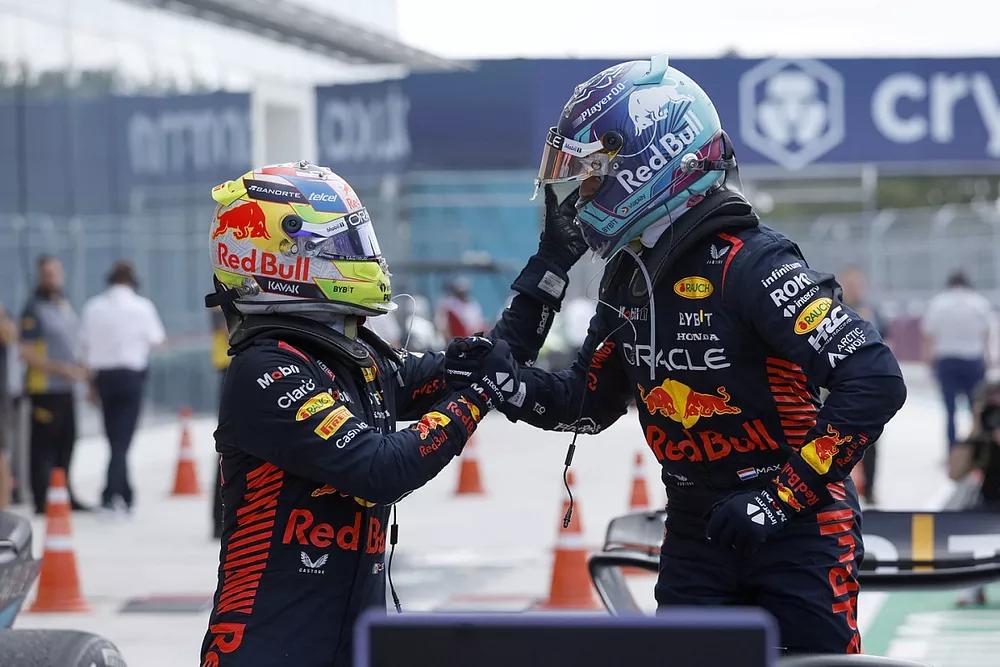 Sergio Perez, Red Bull Racing, 2nd position, Max Verstappen, Red Bull Racing, 1st position, congratulate each other on arrival in Parc Ferme
