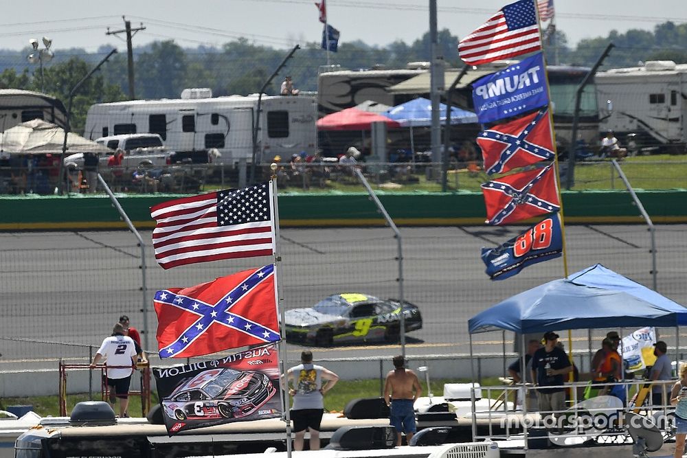 A general view of campers and flags in the infield
