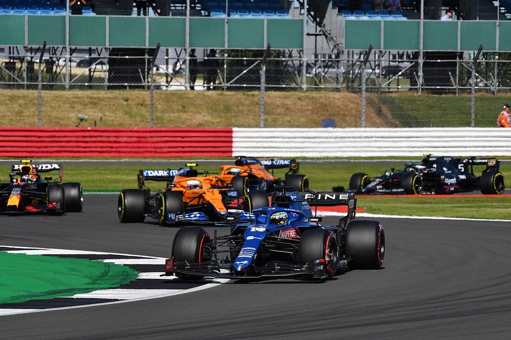 Fernando Alonso, Alpine A521, Lando Norris, McLaren MCL35M, and Sergio Perez, Red Bull Racing RB16B