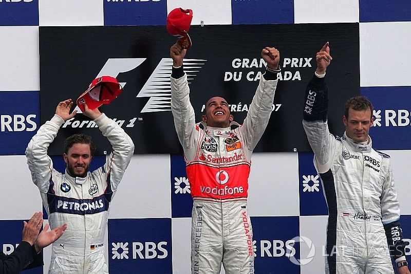 Podium: race winner Lewis Hamilton, McLaren, second place Nick Heidfeld, BMW Sauber F1, third place 