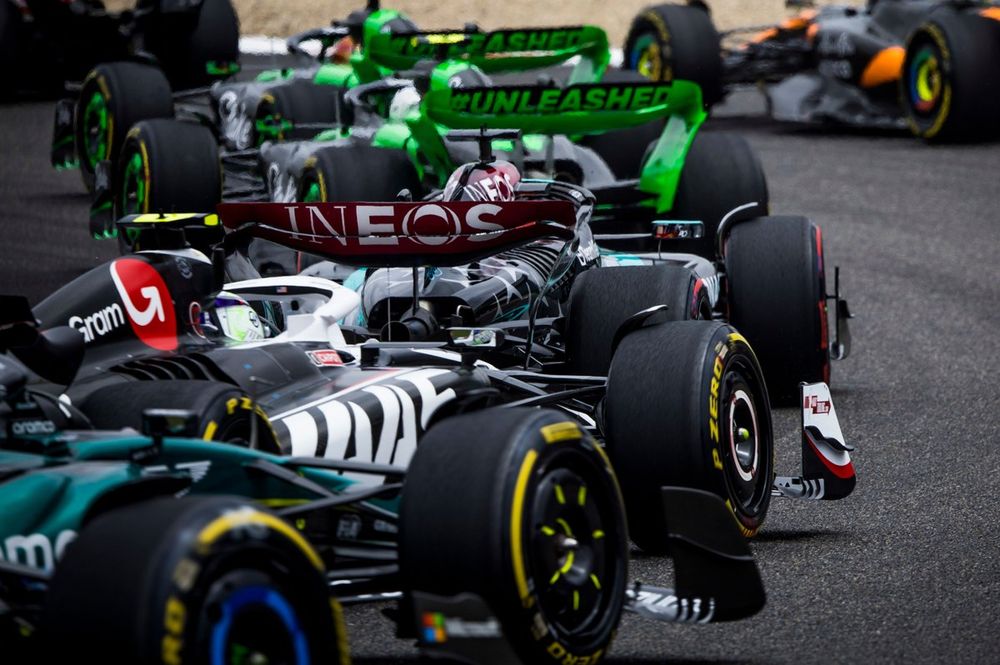 Valtteri Bottas, Kick Sauber F1 Team C44, leads Zhou Guanyu, Kick Sauber F1 Team C44, George Russell, Mercedes F1 W15, and Nico Hulkenberg, Haas VF-24