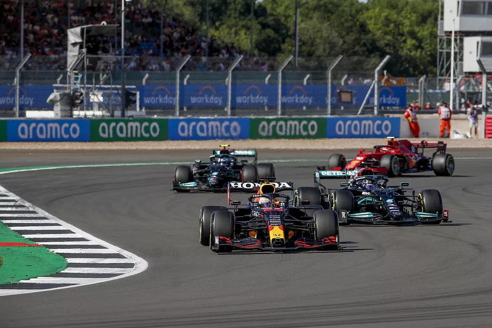 Max Verstappen, Red Bull Racing RB16B, Lewis Hamilton, Mercedes W12, Valtteri Bottas, Mercedes W12, and Charles Leclerc, Ferrari SF21