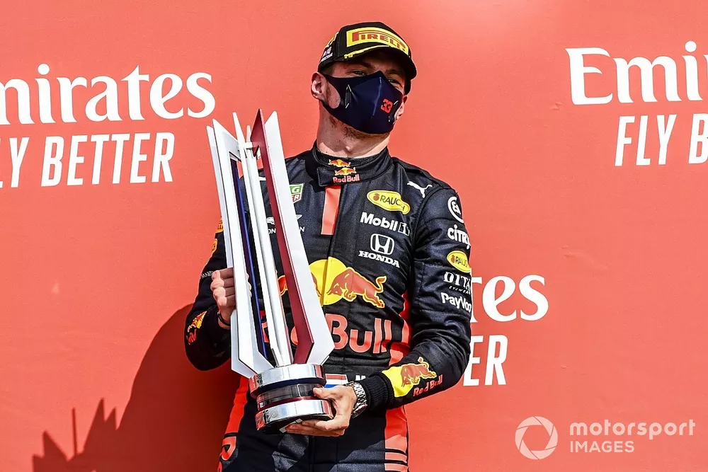 Race Winner Max Verstappen, Red Bull Racing celebrates on the podium with the champagne