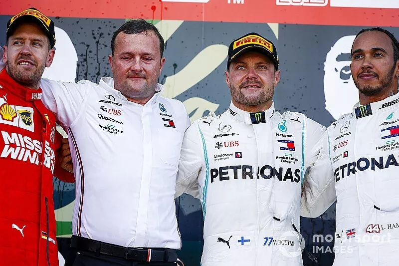 Sebastian Vettel, Ferrari, 2nd position, Eric Blandin, Chief Aerodynamicist, Mercedes AMG, Valtteri Bottas, Mercedes AMG F1, 1st position, and Lewis Hamilton, Mercedes AMG F1, 3rd position, on the podium