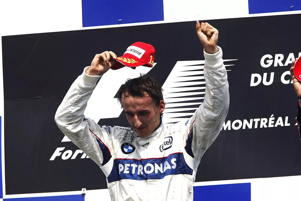 Podio: ganador de la carrera Robert Kubica, BMW Sauber