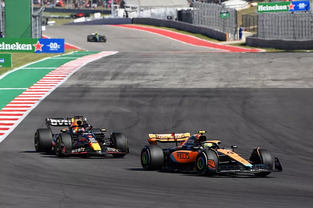 Lando Norris, McLaren MCL60, Max Verstappen, Red Bull Racing RB19