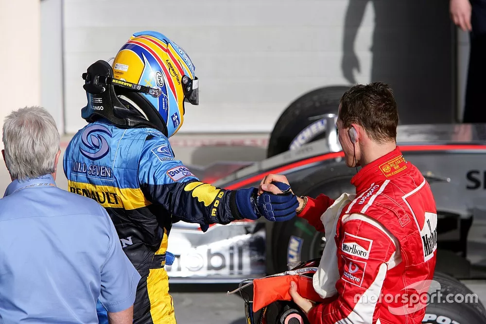 Fernando Alonso, Renault y Michael Schumacher, Ferrari en parc ferm&egrave;