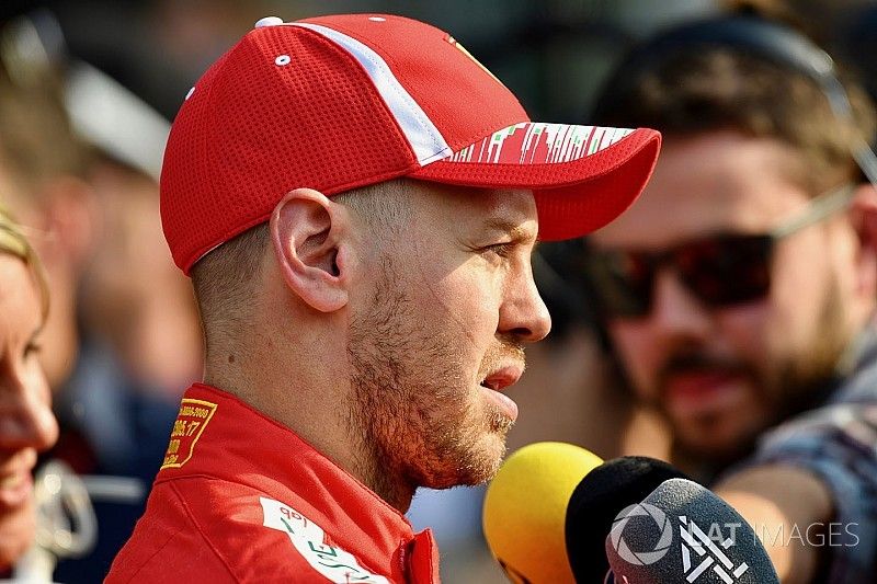 Sebastian Vettel, Ferrari talks with the media