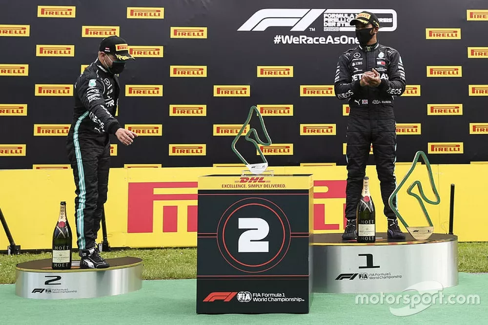 Valtteri Bottas, Mercedes-AMG Petronas F1 celebrates on the podium with the trophy with Race winner Lewis Hamilton, Mercedes-AMG Petronas F1 anDrivers Max Verstappen, Red Bull Racing 