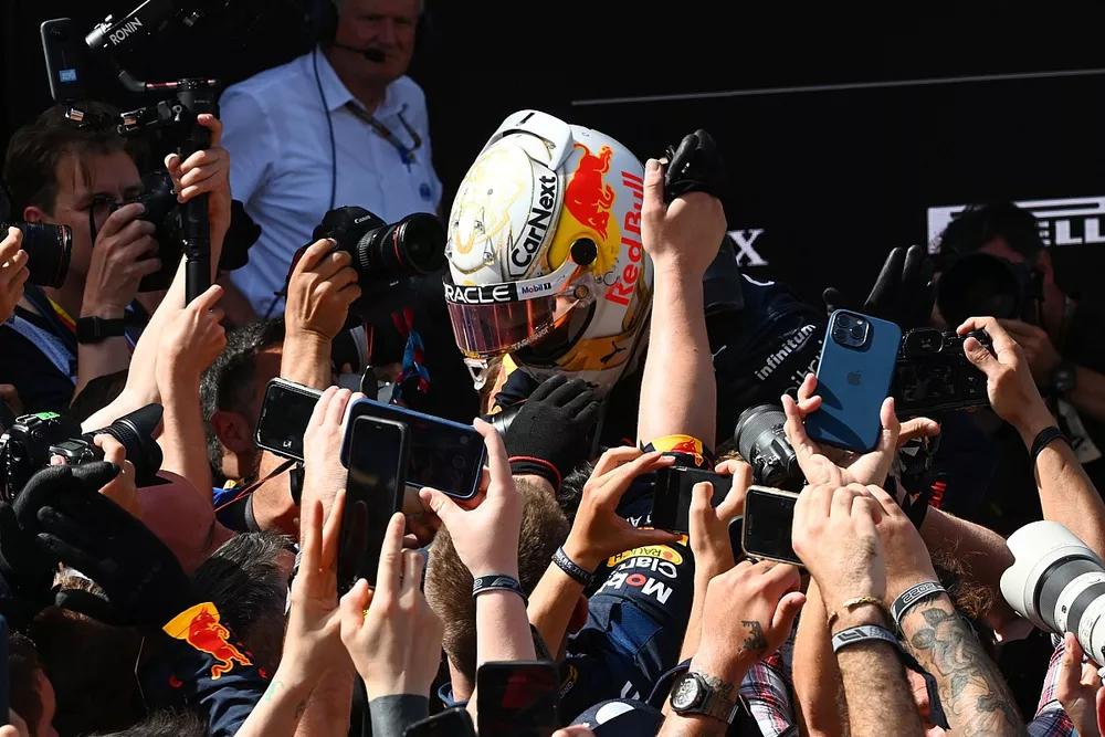 Max Verstappen, Red Bull Racing, 1st position, celebrates with his team in Parc Ferme 