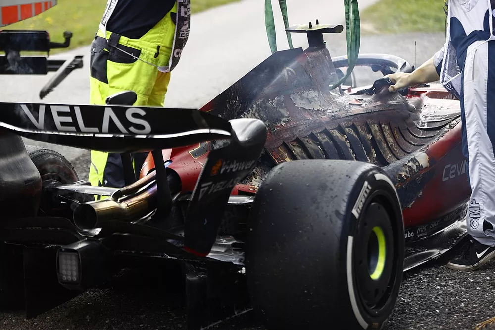The burned out car of Carlos Sainz, Ferrari F1-75, after a fire causes his retirement