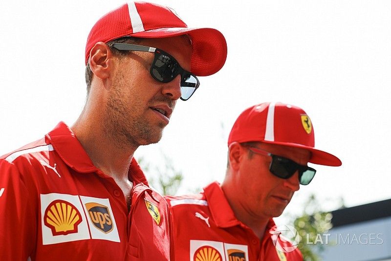 Kimi Raikkonen, Ferrari, and Sebastian Vettel, Ferrari