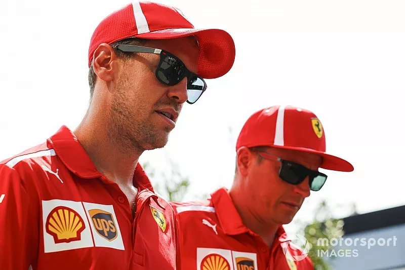 Kimi Raikkonen, Ferrari, and Sebastian Vettel, Ferrari