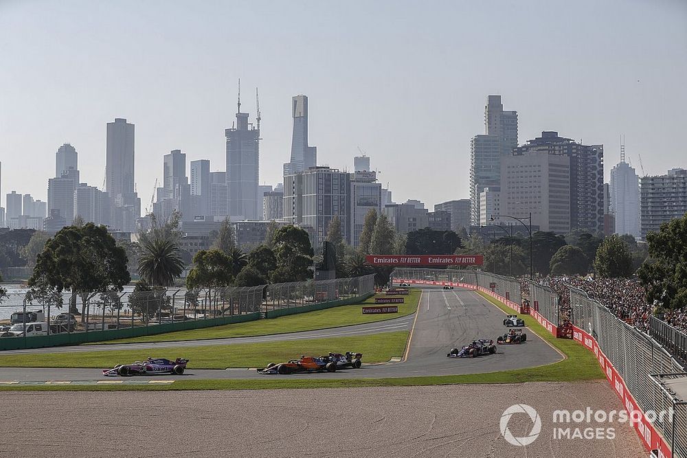 Lance Stroll, Racing Point RP19, leads Carlos Sainz Jr., McLaren MCL34, Antonio Giovinazzi, Alfa Romeo Racing C38, Daniil Kvyat, Toro Rosso STR14, and Pierre Gasly, Red Bull Racing RB15