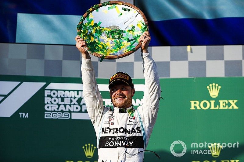 Valtteri Bottas, Mercedes AMG F1, 1st position, lifts his trophy 