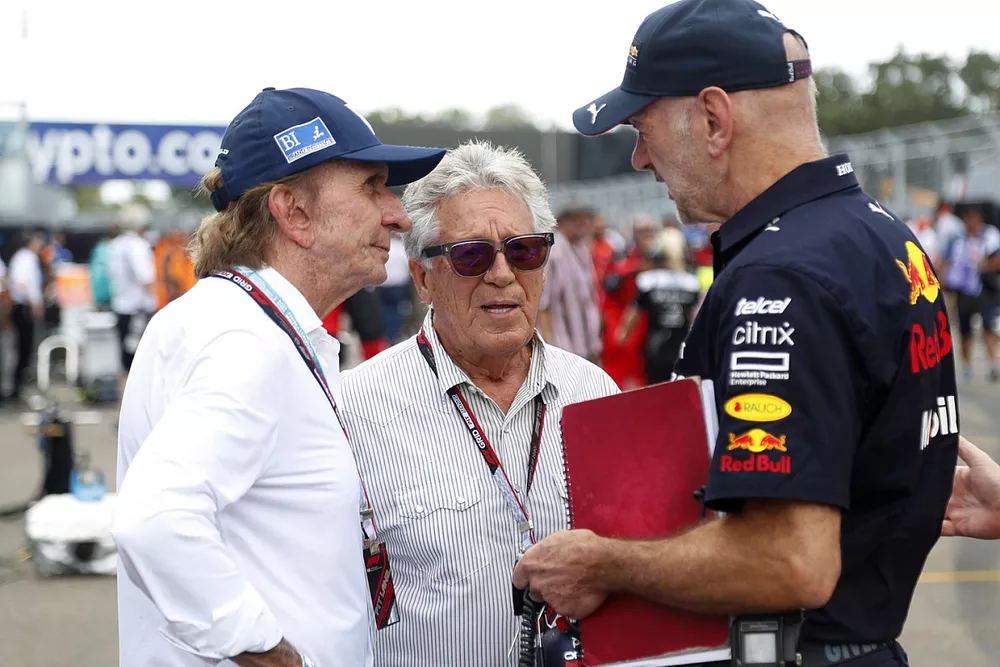 Emerson Fittipaldi and Mario Andretti with Adrian Newey, Chief Technology Officer, Red Bull Racing