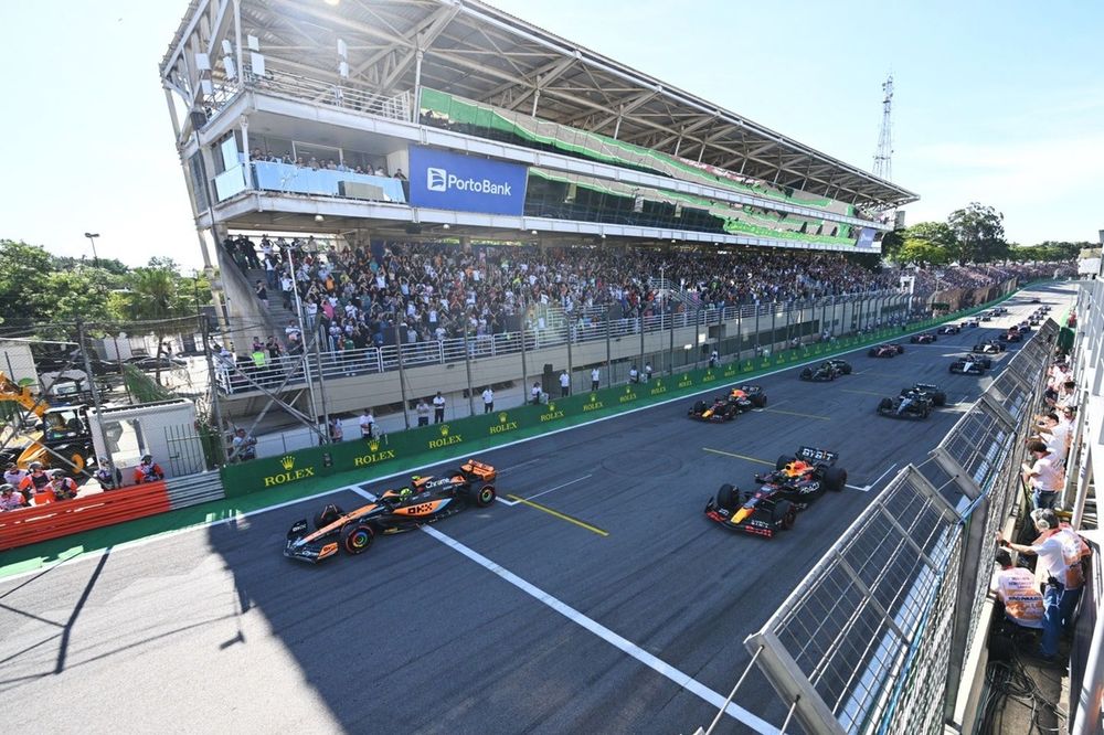 Lando Norris, McLaren MCL60, Max Verstappen, Red Bull Racing RB19, lead the field away for the start of the Sprint race