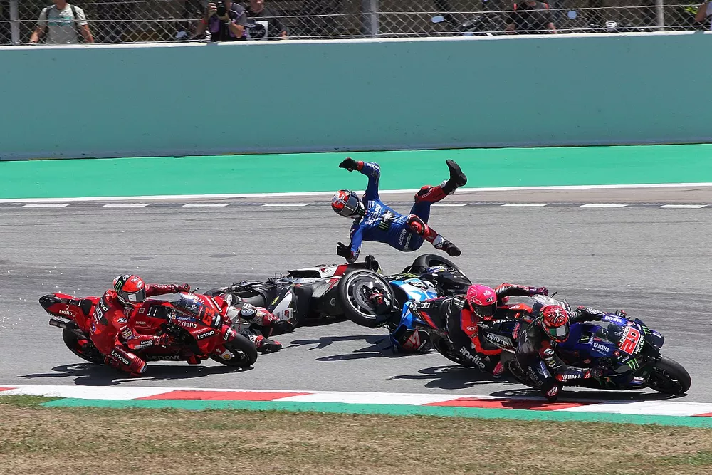Fabio Quartararo, Yamaha Factory Racing leads, Takaaki Nakagami, Team LCR Honda and Alex Rins, Team Suzuki MotoGP crash, Francesco Bagnaia, Ducati Team behind