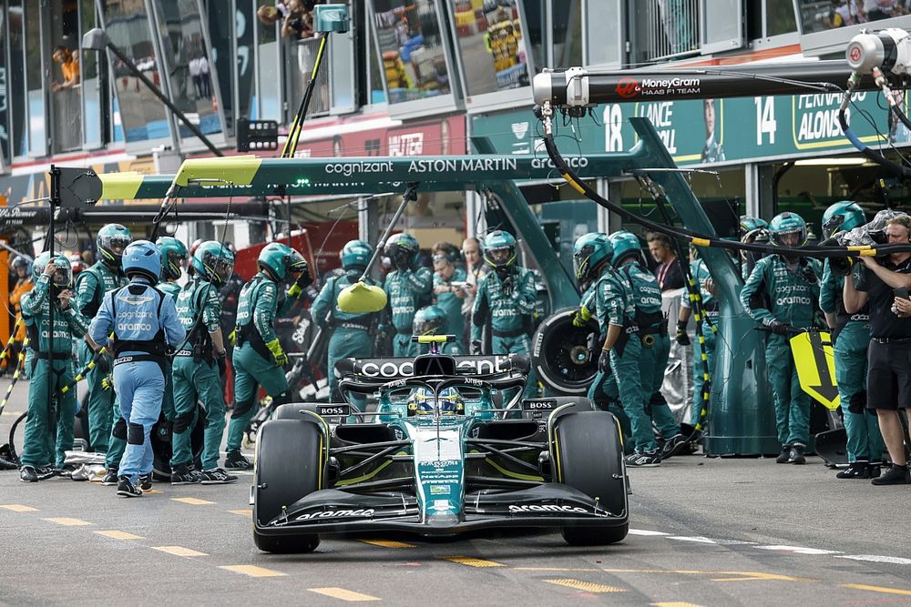 Fernando Alonso, Aston Martin AMR23, leaves the pits after a stop
