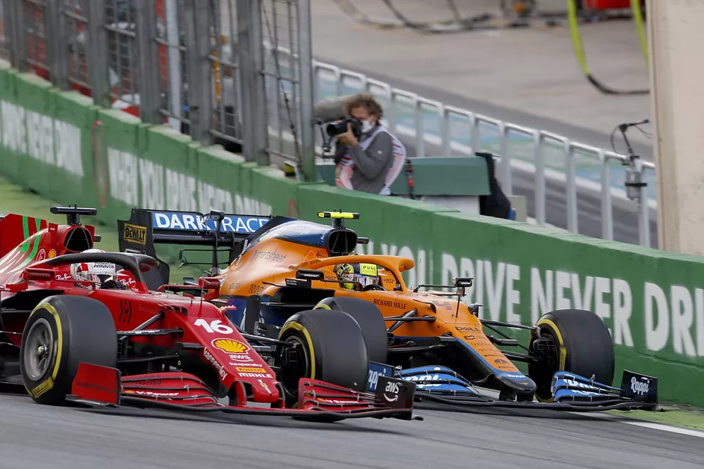 Charles Leclerc, Ferrari SF21, battles with Lando Norris, McLaren MCL35M
