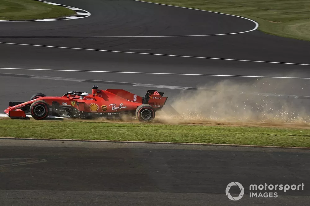 Sebastian Vettel, Ferrari SF1000, kicks up dust and sparks