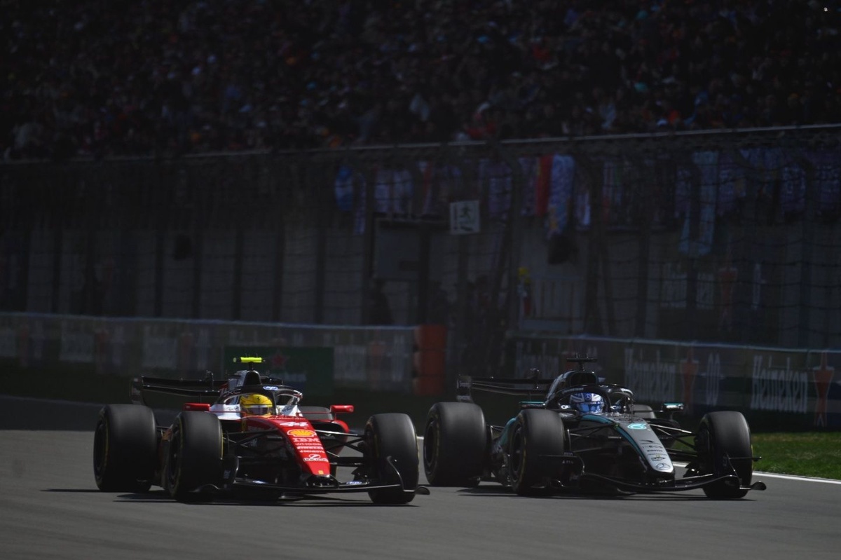 F1 Chinese GP: Russell survives early Hamilton attack to win sprint