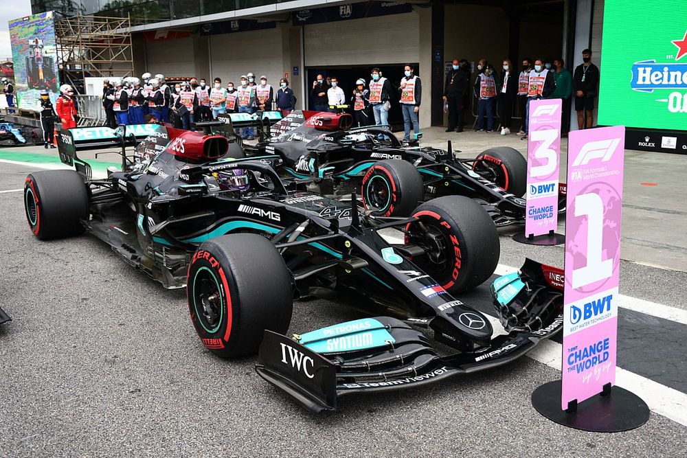 Pole man Lewis Hamilton, Mercedes W12, and Valtteri Bottas, Mercedes W12, arrive in Parc Ferme after Qualifying