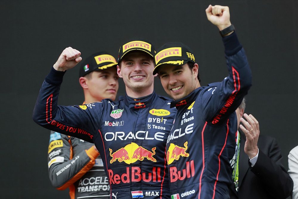 Lando Norris, McLaren, 3rd position, Max Verstappen, Red Bull Racing, 1st position, Sergio Perez, Red Bull Racing, 2nd position, celebrate on the podium