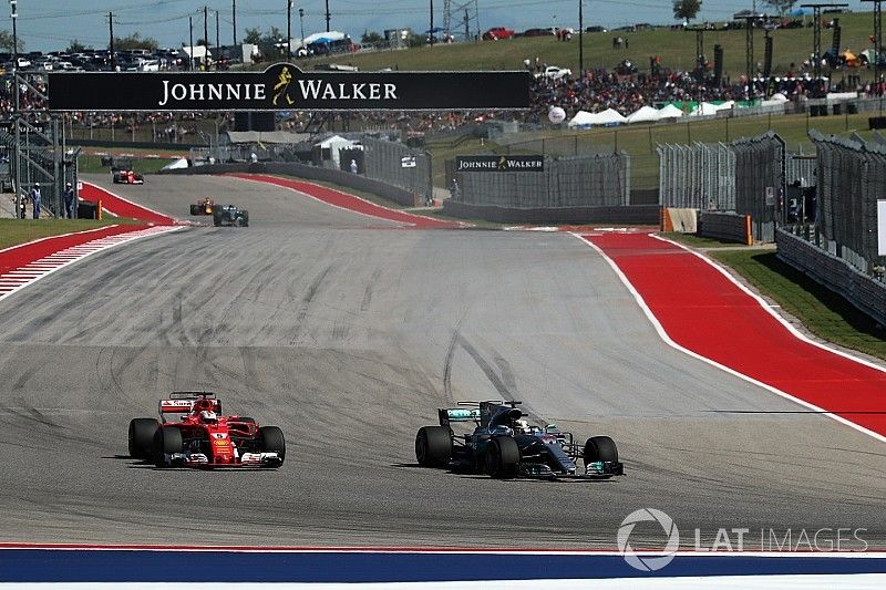 Lewis Hamilton, Mercedes-Benz F1 W08  overtakes Sebastian Vettel, Ferrari SF70H to take the lead