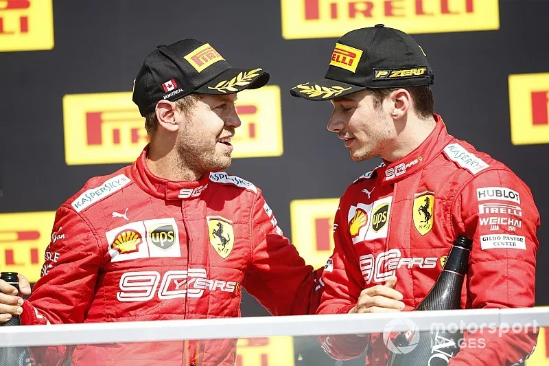 Sebastian Vettel, Ferrari, 2nd position, and Charles Leclerc, Ferrari, 3rd position, on the podium