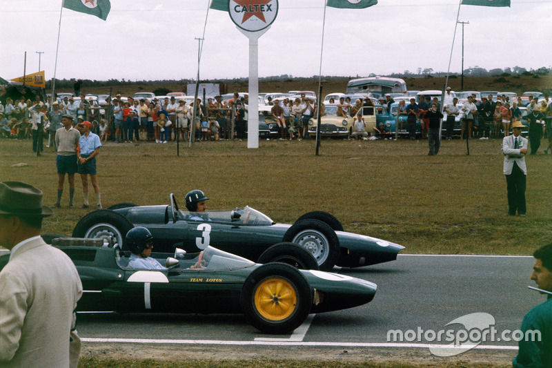 Graham Hill, BRM P57 and Jim Clark, Lotus 25 Climax