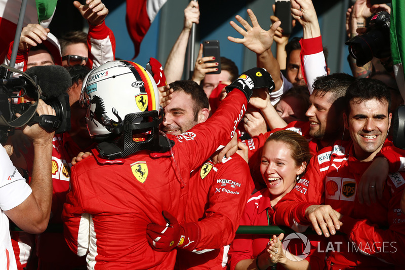 Sebastian Vettel, Ferrari, 1st position. celebrates with his team on arrival in Parc Ferme